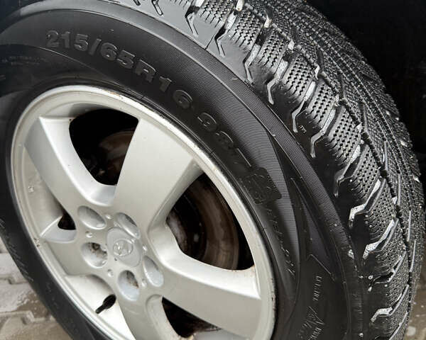 Серый Хендай Туксон, объемом двигателя 1.98 л и пробегом 193 тыс. км за 6500 $, фото 20 на Automoto.ua