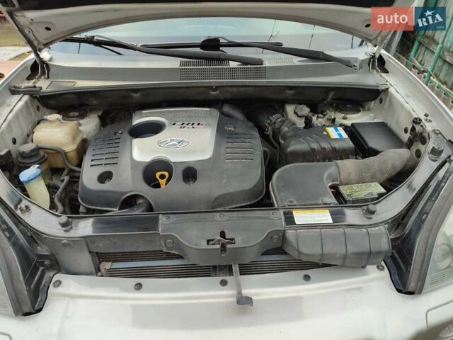 Серый Хендай Туксон, объемом двигателя 1.99 л и пробегом 178 тыс. км за 6700 $, фото 18 на Automoto.ua