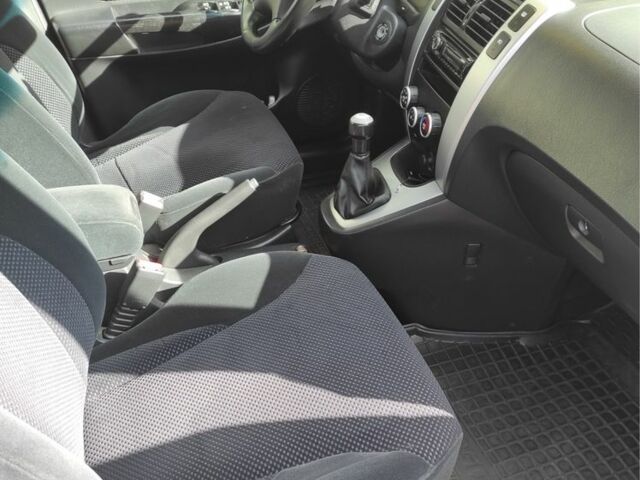 Сірий Хендай Туксон, об'ємом двигуна 2 л та пробігом 159 тис. км за 6700 $, фото 6 на Automoto.ua