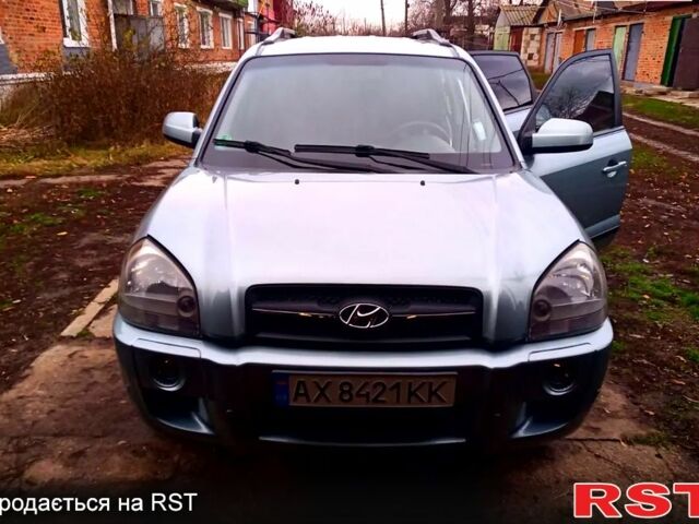 Серый Хендай Туксон, объемом двигателя 2 л и пробегом 179 тыс. км за 8500 $, фото 4 на Automoto.ua