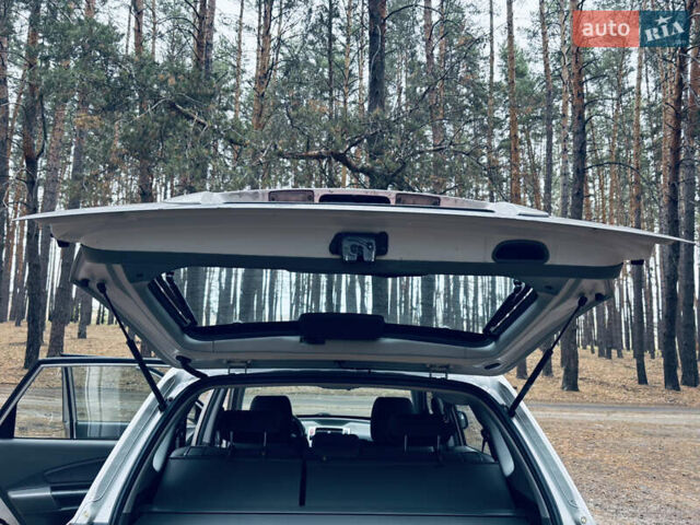 Сірий Хендай Туксон, об'ємом двигуна 1.98 л та пробігом 186 тис. км за 8200 $, фото 39 на Automoto.ua