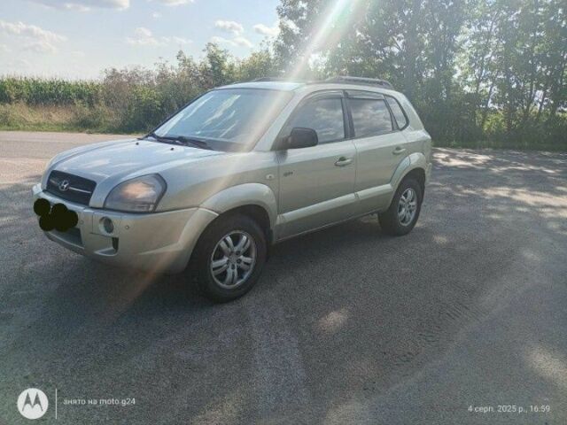 Сірий Хендай Туксон, об'ємом двигуна 2 л та пробігом 270 тис. км за 7000 $, фото 3 на Automoto.ua