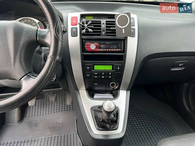 Серый Хендай Туксон, объемом двигателя 2 л и пробегом 263 тыс. км за 7440 $, фото 24 на Automoto.ua