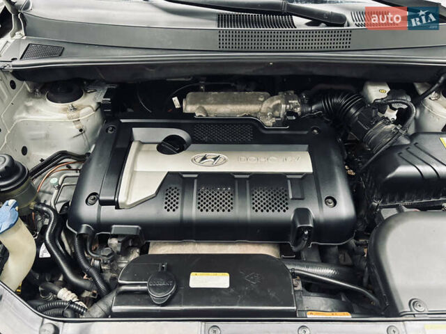 Сірий Хендай Туксон, об'ємом двигуна 1.98 л та пробігом 186 тис. км за 8200 $, фото 31 на Automoto.ua