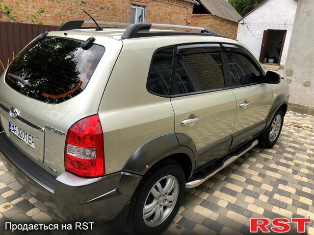 Сірий Хендай Туксон, об'ємом двигуна 2 л та пробігом 252 тис. км за 8300 $, фото 9 на Automoto.ua