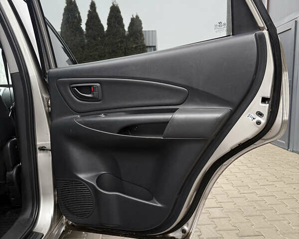 Серый Хендай Туксон, объемом двигателя 1.98 л и пробегом 193 тыс. км за 6500 $, фото 12 на Automoto.ua