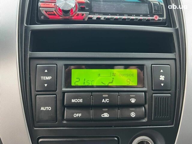 Сірий Хендай Туксон, об'ємом двигуна 2 л та пробігом 263 тис. км за 7440 $, фото 26 на Automoto.ua