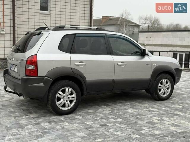 Серый Хендай Туксон, объемом двигателя 1.98 л и пробегом 252 тыс. км за 6950 $, фото 5 на Automoto.ua