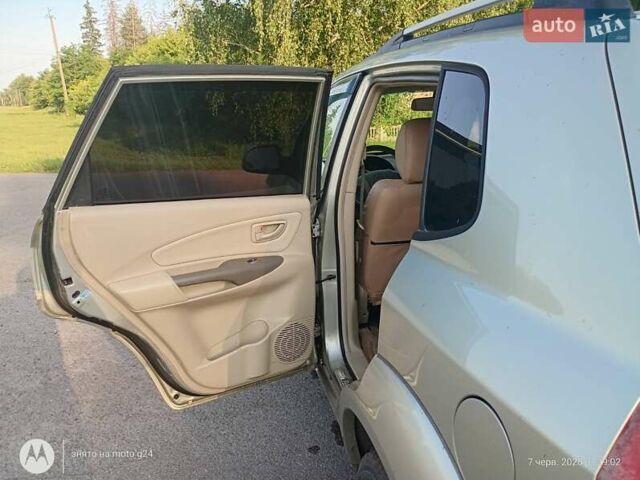 Сірий Хендай Туксон, об'ємом двигуна 1.98 л та пробігом 270 тис. км за 7000 $, фото 10 на Automoto.ua