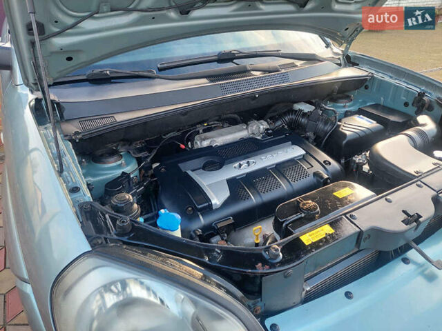 Сірий Хендай Туксон, об'ємом двигуна 1.98 л та пробігом 175 тис. км за 6250 $, фото 10 на Automoto.ua