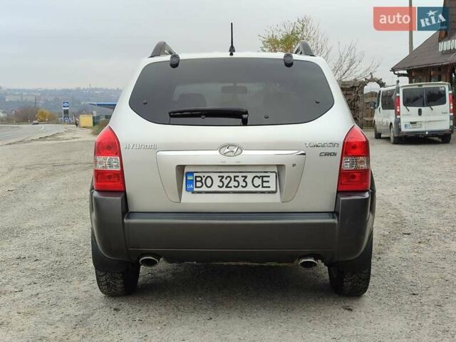 Серый Хендай Туксон, объемом двигателя 1.99 л и пробегом 210 тыс. км за 7900 $, фото 3 на Automoto.ua
