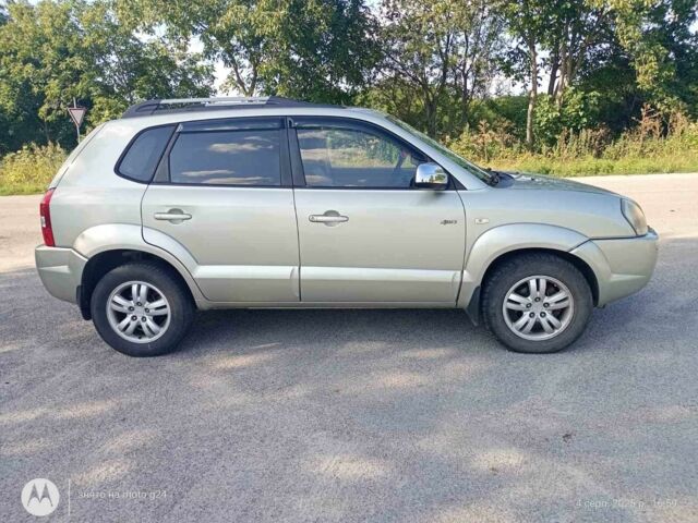 Сірий Хендай Туксон, об'ємом двигуна 2 л та пробігом 270 тис. км за 7000 $, фото 10 на Automoto.ua