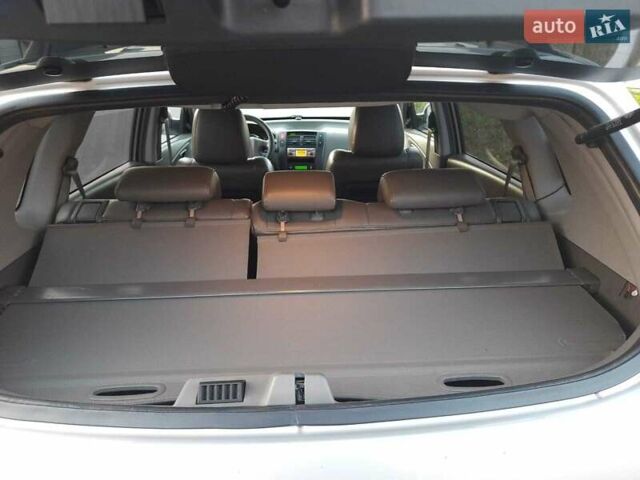 Серый Хендай Туксон, объемом двигателя 1.98 л и пробегом 164 тыс. км за 7300 $, фото 1 на Automoto.ua