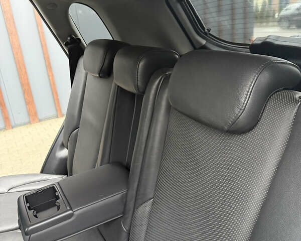 Серый Хендай Туксон, объемом двигателя 1.98 л и пробегом 193 тыс. км за 6500 $, фото 2 на Automoto.ua