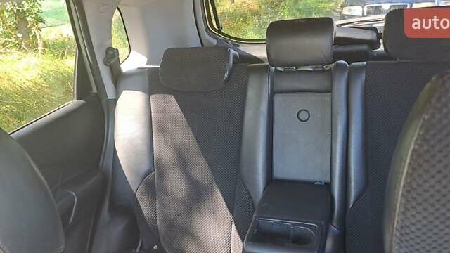 Сірий Хендай Туксон, об'ємом двигуна 2 л та пробігом 297 тис. км за 7300 $, фото 6 на Automoto.ua