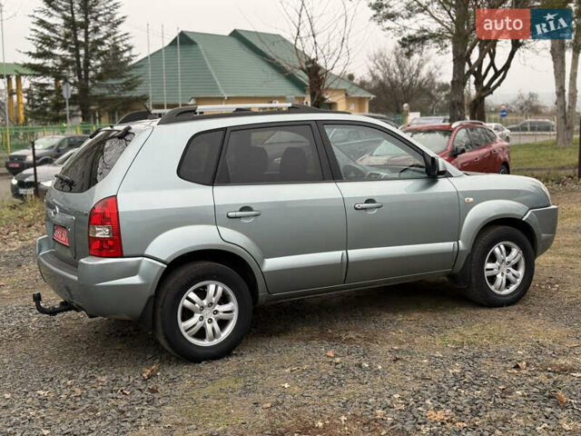 Серый Хендай Туксон, объемом двигателя 2 л и пробегом 231 тыс. км за 6999 $, фото 7 на Automoto.ua
