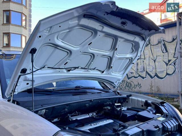 Сірий Хендай Туксон, об'ємом двигуна 2 л та пробігом 215 тис. км за 7350 $, фото 77 на Automoto.ua