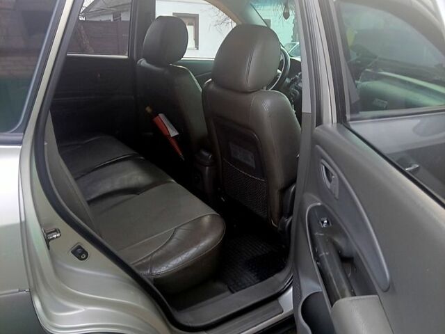 Сірий Хендай Туксон, об'ємом двигуна 2 л та пробігом 300 тис. км за 7000 $, фото 6 на Automoto.ua