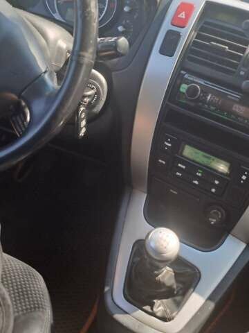 Сірий Хендай Туксон, об'ємом двигуна 2 л та пробігом 297 тис. км за 7300 $, фото 5 на Automoto.ua