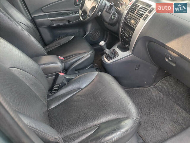 Сірий Хендай Туксон, об'ємом двигуна 1.98 л та пробігом 175 тис. км за 6250 $, фото 6 на Automoto.ua