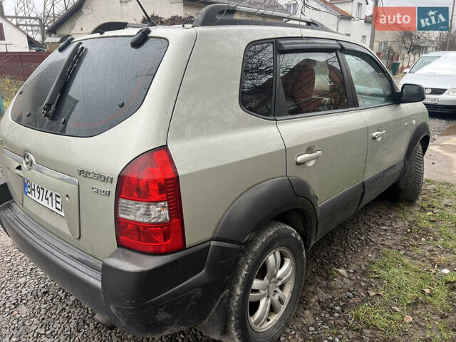 Серый Хендай Туксон, объемом двигателя 2 л и пробегом 270 тыс. км за 4300 $, фото 5 на Automoto.ua