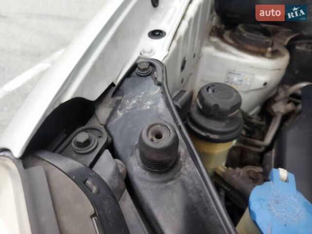 Серый Хендай Туксон, объемом двигателя 1.98 л и пробегом 278 тыс. км за 5300 $, фото 21 на Automoto.ua