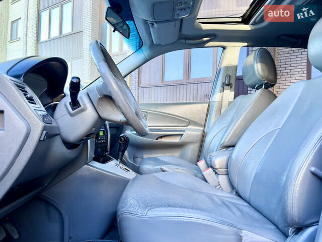 Сірий Хендай Туксон, об'ємом двигуна 2 л та пробігом 215 тис. км за 7350 $, фото 32 на Automoto.ua