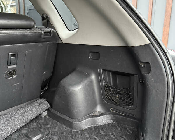 Серый Хендай Туксон, объемом двигателя 1.98 л и пробегом 193 тыс. км за 6500 $, фото 17 на Automoto.ua