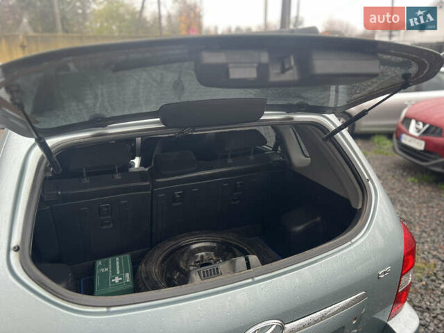 Серый Хендай Туксон, объемом двигателя 1.98 л и пробегом 253 тыс. км за 7650 $, фото 24 на Automoto.ua