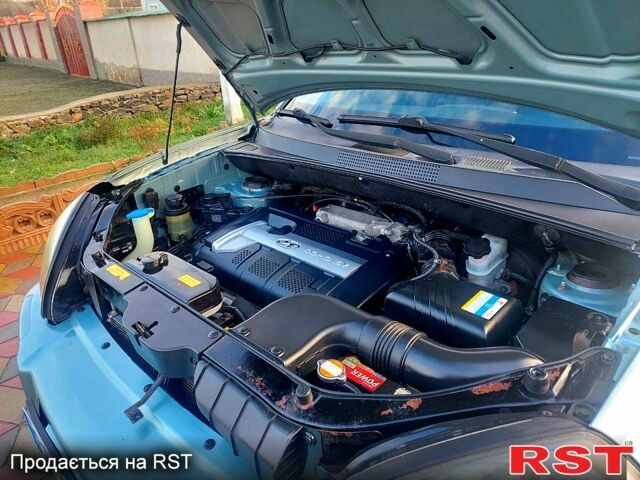 Серый Хендай Туксон, объемом двигателя 2 л и пробегом 175 тыс. км за 6250 $, фото 12 на Automoto.ua