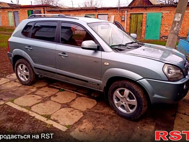 Серый Хендай Туксон, объемом двигателя 2 л и пробегом 179 тыс. км за 8500 $, фото 5 на Automoto.ua