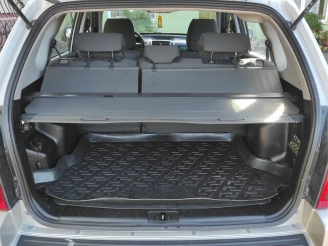 Сірий Хендай Туксон, об'ємом двигуна 2 л та пробігом 159 тис. км за 6700 $, фото 7 на Automoto.ua