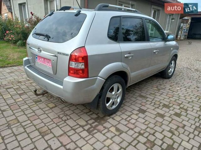 Серый Хендай Туксон, объемом двигателя 2 л и пробегом 224 тыс. км за 6900 $, фото 7 на Automoto.ua