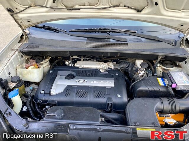 Сірий Хендай Туксон, об'ємом двигуна 2 л та пробігом 245 тис. км за 6500 $, фото 4 на Automoto.ua