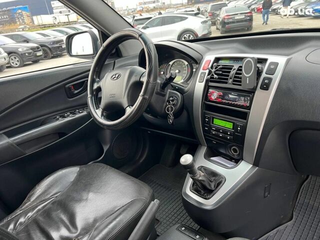 Сірий Хендай Туксон, об'ємом двигуна 2 л та пробігом 263 тис. км за 7440 $, фото 36 на Automoto.ua