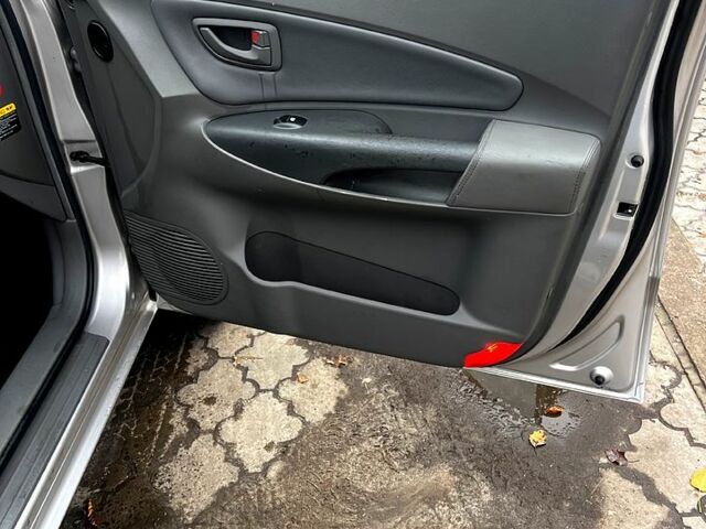 Серый Хендай Туксон, объемом двигателя 2 л и пробегом 228 тыс. км за 8000 $, фото 11 на Automoto.ua