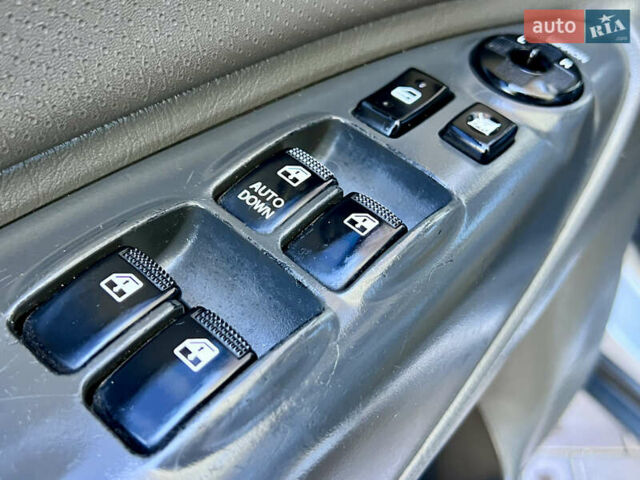 Сірий Хендай Туксон, об'ємом двигуна 2 л та пробігом 215 тис. км за 7350 $, фото 37 на Automoto.ua