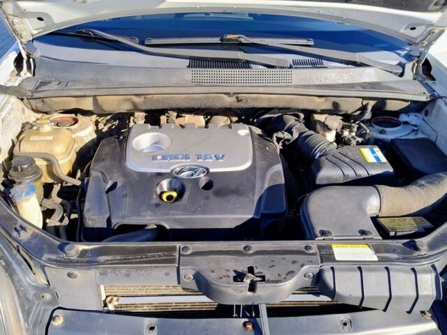 Сірий Хендай Туксон, об'ємом двигуна 2 л та пробігом 304 тис. км за 7500 $, фото 4 на Automoto.ua