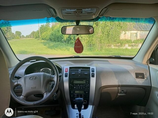 Сірий Хендай Туксон, об'ємом двигуна 2 л та пробігом 270 тис. км за 7000 $, фото 14 на Automoto.ua