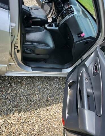 Серый Хендай Туксон, объемом двигателя 2 л и пробегом 260 тыс. км за 7000 $, фото 8 на Automoto.ua