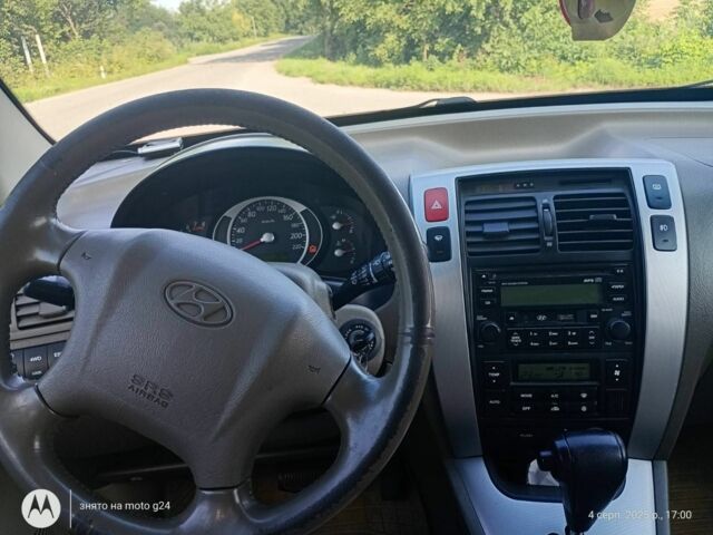 Сірий Хендай Туксон, об'ємом двигуна 2 л та пробігом 270 тис. км за 7000 $, фото 11 на Automoto.ua