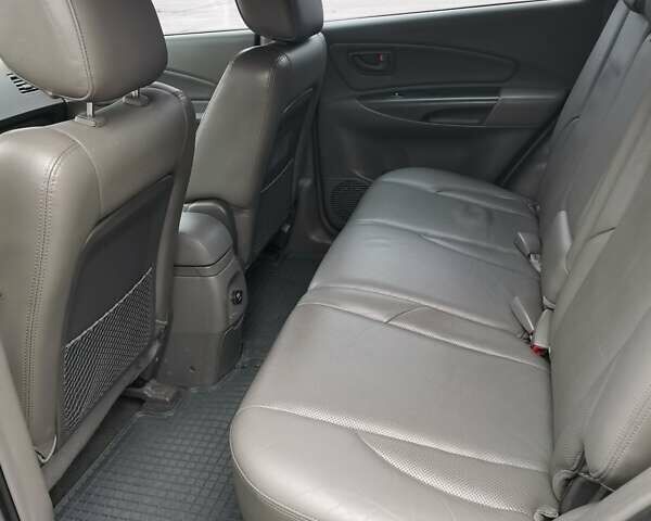 Сірий Хендай Туксон, об'ємом двигуна 1.98 л та пробігом 160 тис. км за 8000 $, фото 15 на Automoto.ua