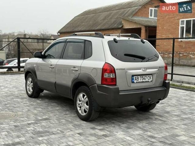 Серый Хендай Туксон, объемом двигателя 1.98 л и пробегом 252 тыс. км за 6950 $, фото 9 на Automoto.ua