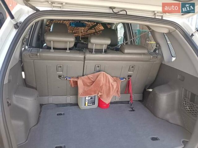 Сірий Хендай Туксон, об'ємом двигуна 1.99 л та пробігом 252 тис. км за 7000 $, фото 14 на Automoto.ua