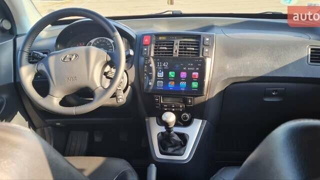 Сірий Хендай Туксон, об'ємом двигуна 1.99 л та пробігом 190 тис. км за 9600 $, фото 18 на Automoto.ua