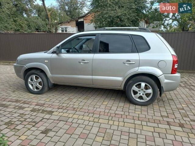 Серый Хендай Туксон, объемом двигателя 2 л и пробегом 224 тыс. км за 6900 $, фото 6 на Automoto.ua