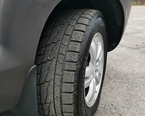 Сірий Хендай Туксон, об'ємом двигуна 1.98 л та пробігом 160 тис. км за 8000 $, фото 4 на Automoto.ua