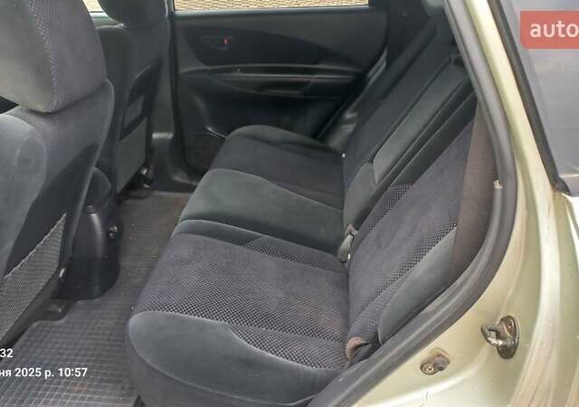 Серый Хендай Туксон, объемом двигателя 1.99 л и пробегом 303 тыс. км за 6500 $, фото 9 на Automoto.ua