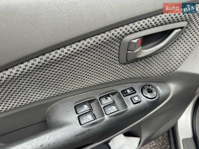 Сірий Хендай Туксон, об'ємом двигуна 1.98 л та пробігом 255 тис. км за 7000 $, фото 20 на Automoto.ua