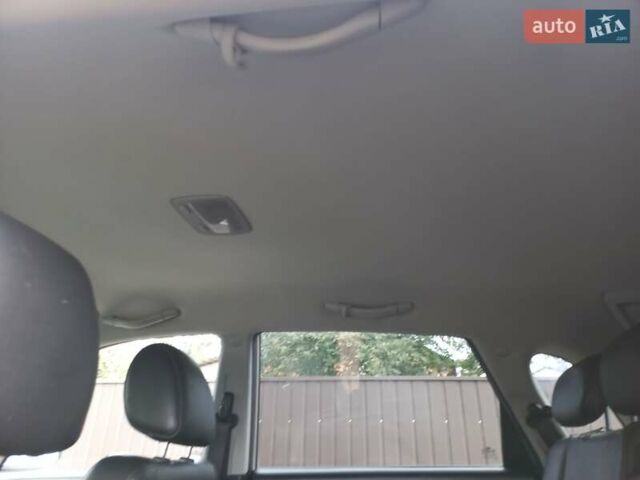 Серый Хендай Туксон, объемом двигателя 2 л и пробегом 224 тыс. км за 6900 $, фото 10 на Automoto.ua